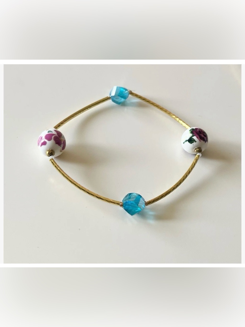 Blue and Floral Bead Gold Cable Bracelet